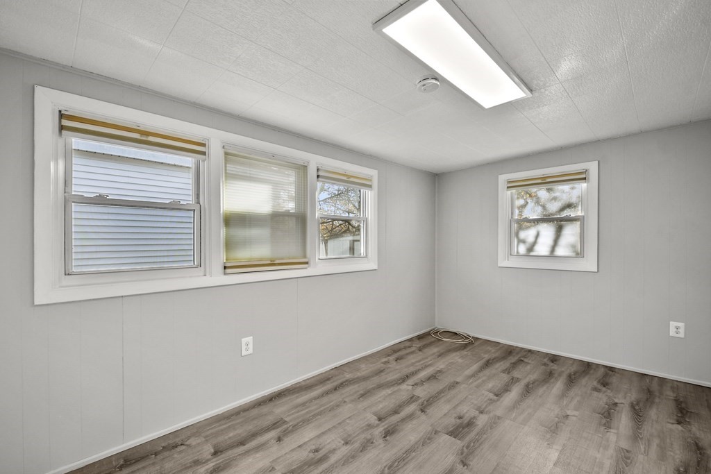 40 Eldorado Drive Marlborough, MA 01752 - Photo 15 of 26 a view of empty room with windows
