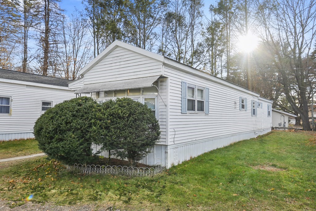 40 Eldorado Drive Marlborough, MA 01752 - Photo 22 of 26 a front view of a house with a yard
