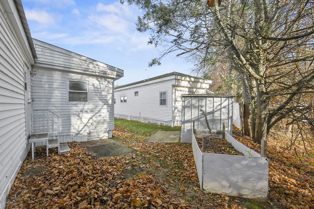 40 Eldorado Drive Marlborough, MA 01752 - Photo 24 of 26 a front view of a house with a yard