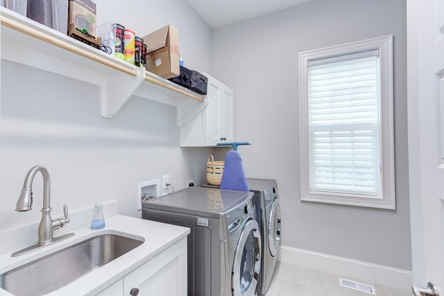 1017 Bradburn Drive Durham, NC 27713 - Photo 20 of 34 a utility room with dryer and washer
