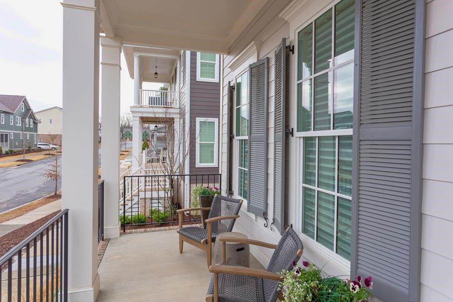 1017 Bradburn Drive Durham, NC 27713 - Photo 2 of 34 a view of balcony with furniture