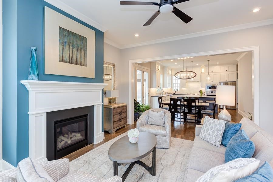 1017 Bradburn Drive Durham, NC 27713 - Photo 3 of 34 a living room with furniture and a fireplace