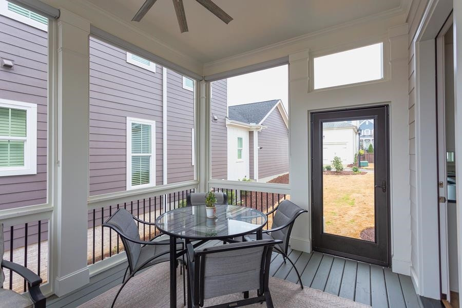 1017 Bradburn Drive Durham, NC 27713 - Photo 9 of 34 a view of a dining room with furniture and window