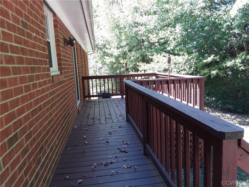 5302 Ridgerun Place Chesterfield, VA 23832 - Photo 15 of 16 a balcony with wooden floor and fence