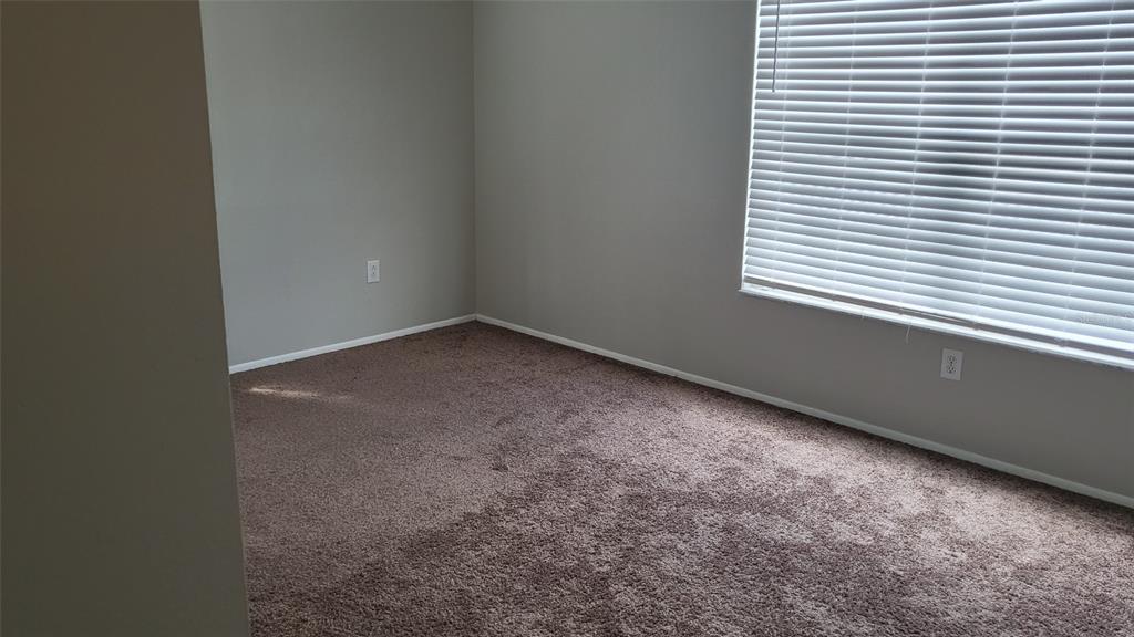 721 Kensington Lake Circle Brandon, FL 33511 - Photo 12 of 15 a view of a room that has a window in it