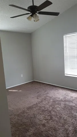 a view of a window in an empty room