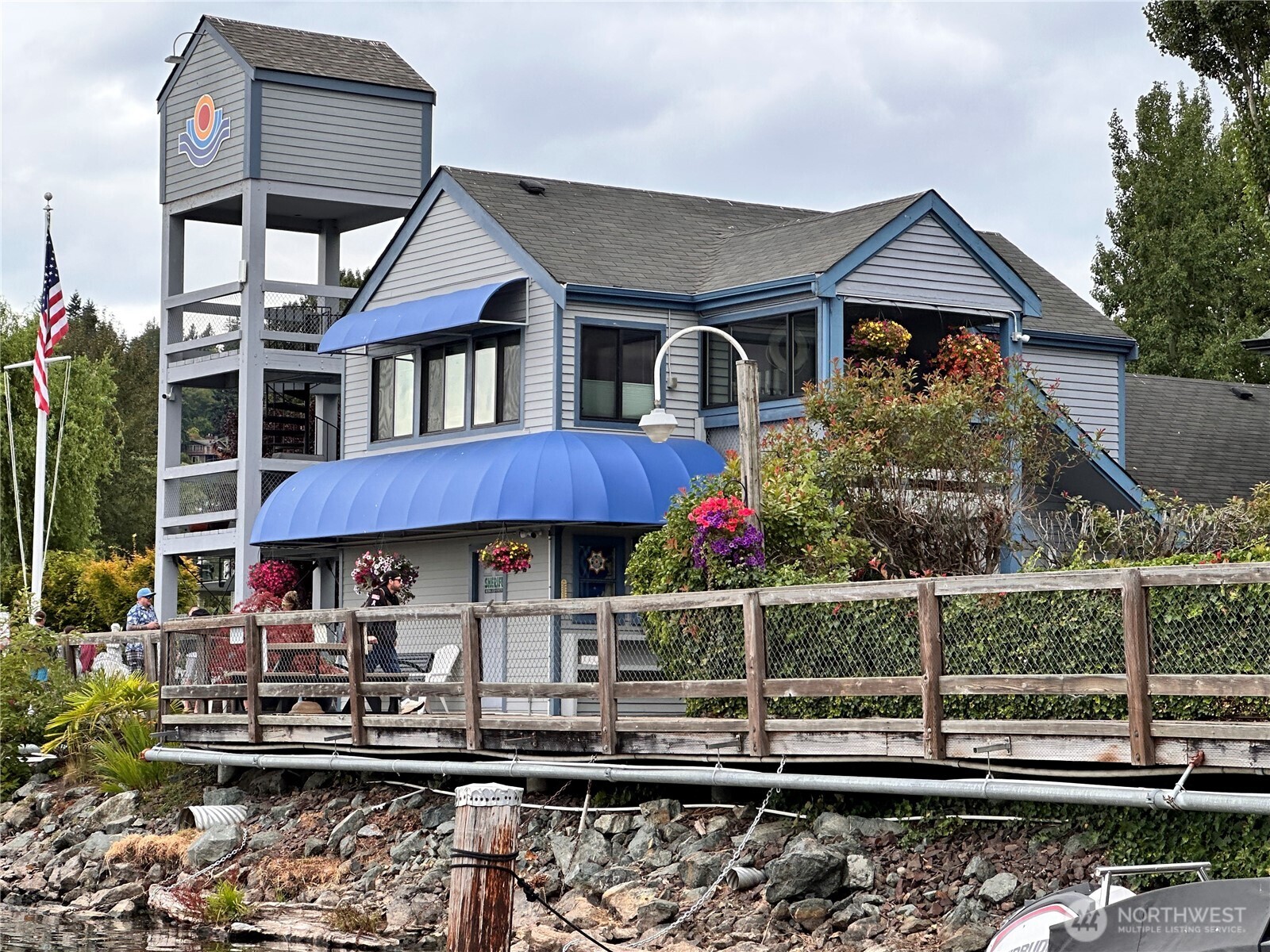 6155 Northeast 175th Street, Unit 227 Kenmore, WA 98028 - Photo 7 of 14 a front view of a house with porch
