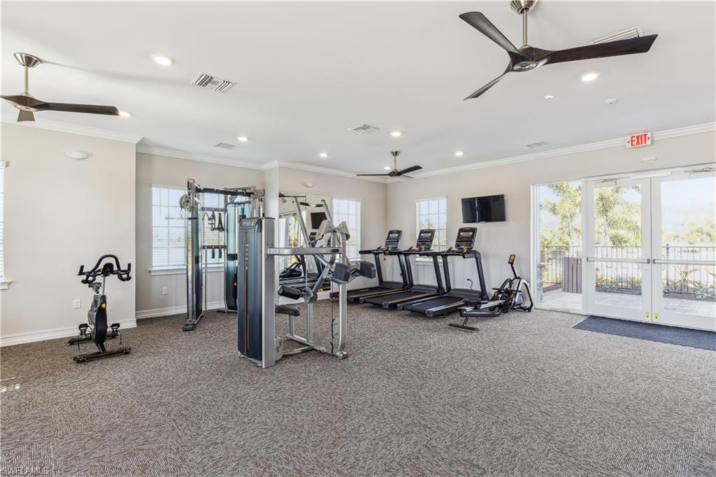 8022 Cedar Ky Way Lehigh Acres, FL 33971 - Photo 31 of 45 a view of a room with gym equipment