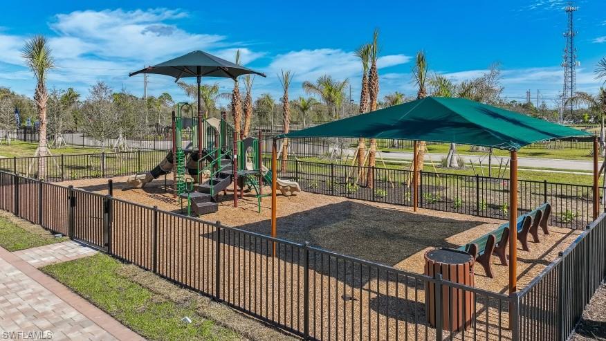 8022 Cedar Ky Way Lehigh Acres, FL 33971 - Photo 44 of 45 a view of a swimming pool with a patio