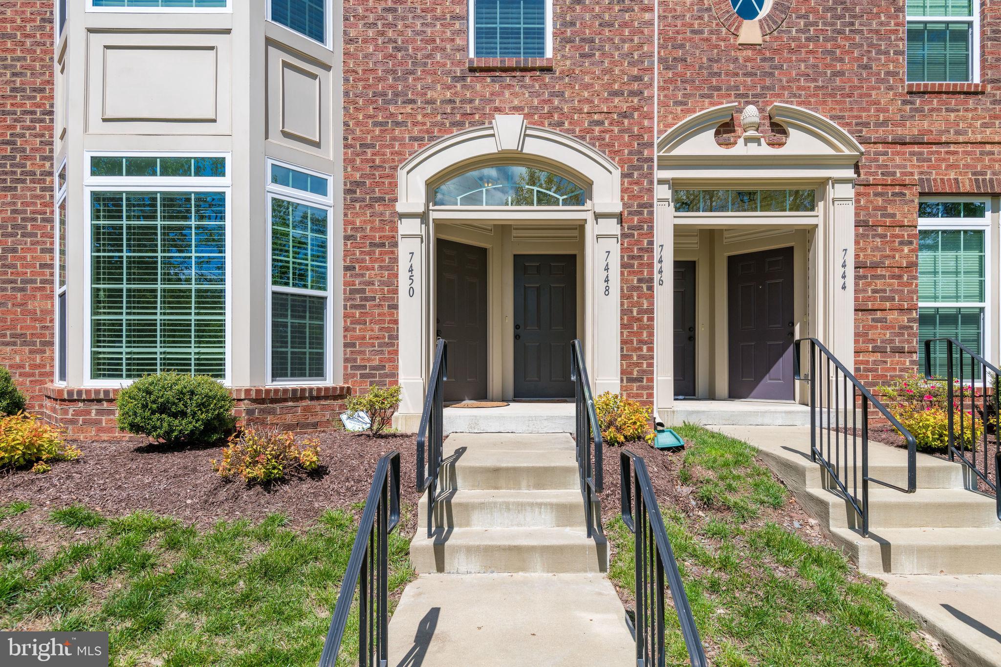 7450 Brunson Circle Gainesville, VA 20155 - Photo 2 of 39 Entry into condo - view of trees to front of unit!