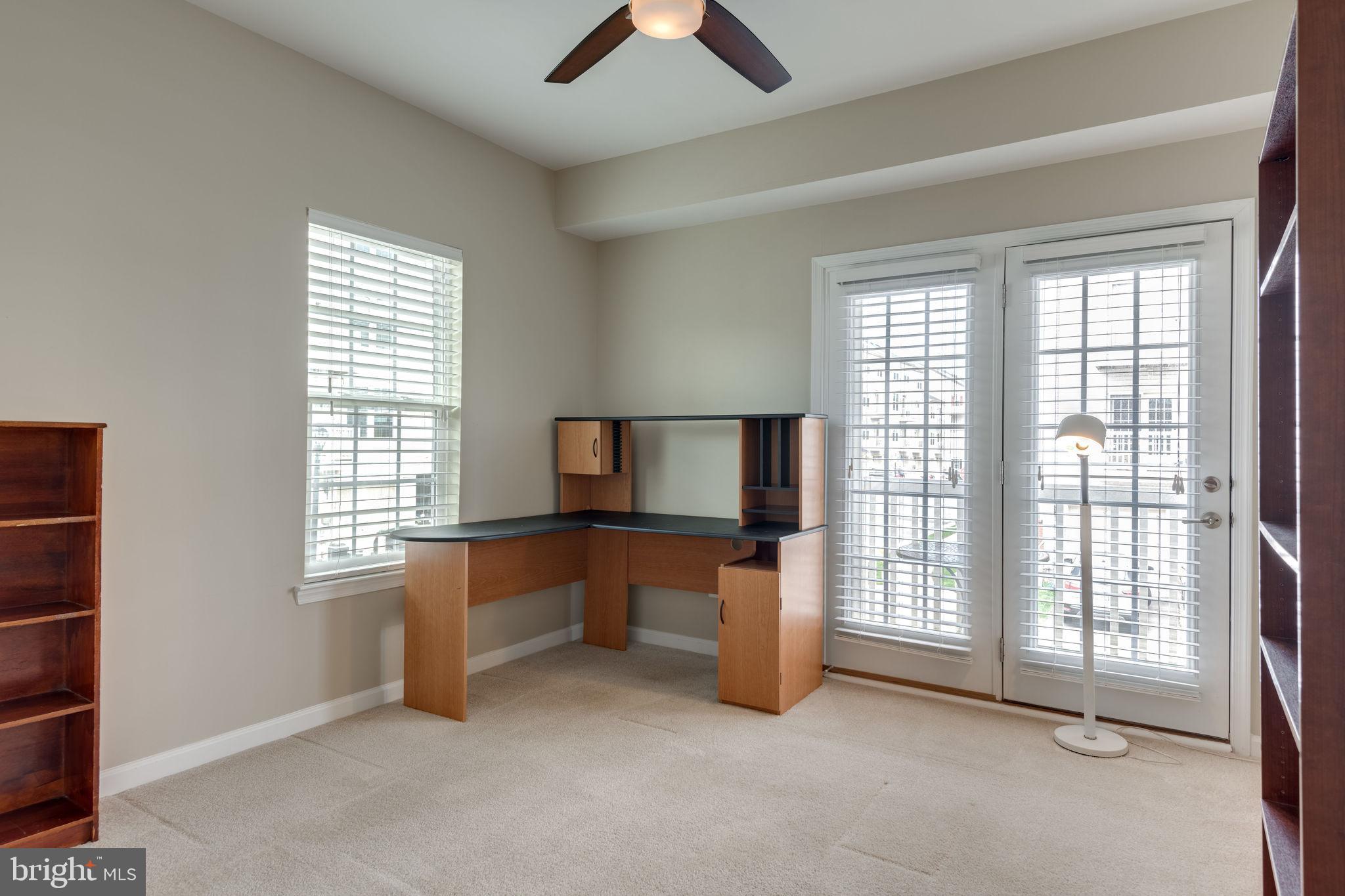 7450 Brunson Circle Gainesville, VA 20155 - Photo 25 of 39 Second bedroom w/atrium door to balcony