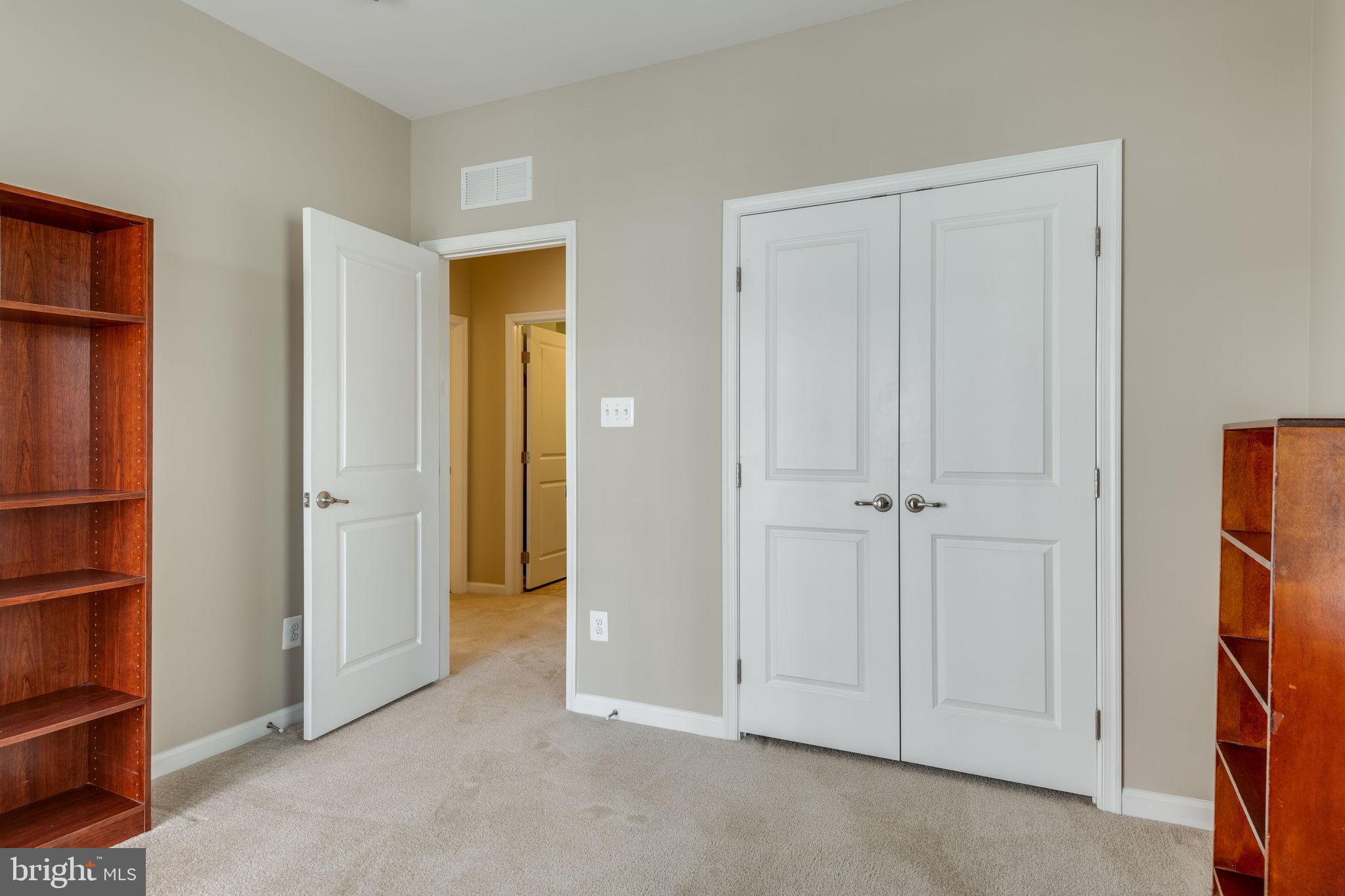 7450 Brunson Circle Gainesville, VA 20155 - Photo 26 of 39 Second bedroom closet & doorway