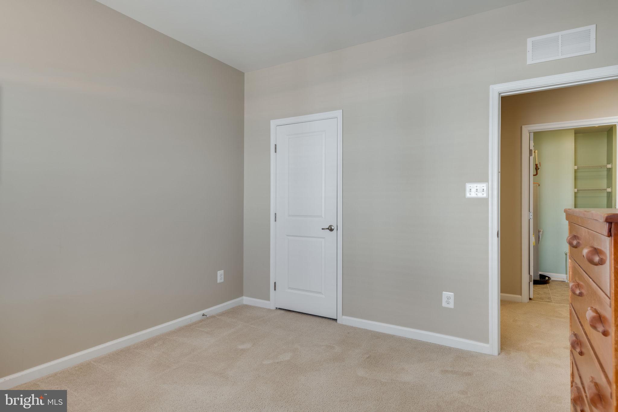 7450 Brunson Circle Gainesville, VA 20155 - Photo 28 of 39 Third bedroom door to closet and doorway