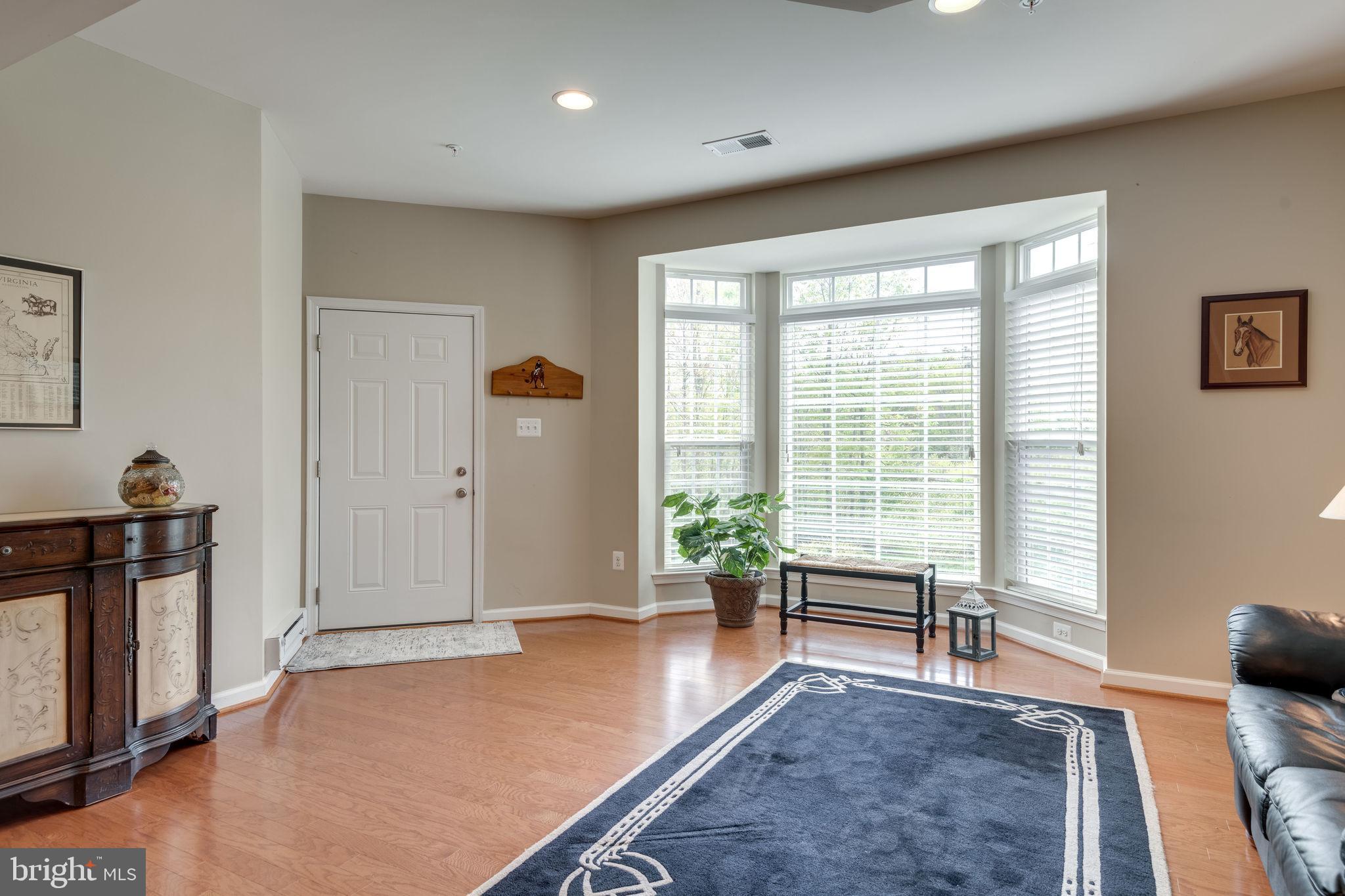 7450 Brunson Circle Gainesville, VA 20155 - Photo 5 of 39 Sunny bay window allows plenty of light!
