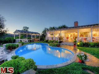 11500 Orum Road Los Angeles, CA 90049 - Photo 1 of 1 a view of a swimming pool with a patio