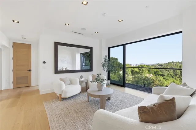 a kitchen with stainless steel appliances kitchen island a large island in the center