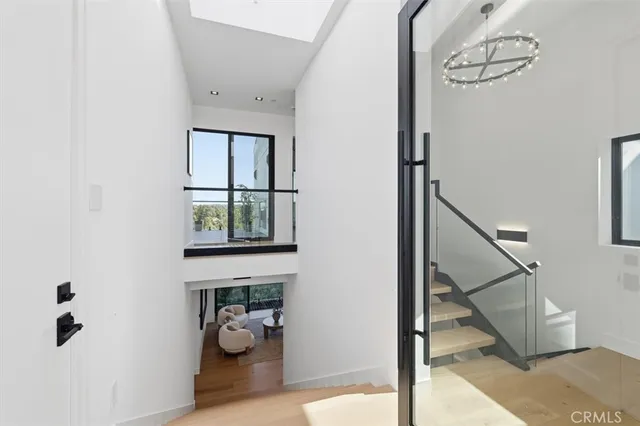 a bedroom with a bed and a rug