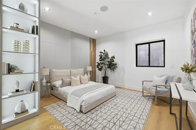 a bathroom with a double vanity sink a mirror and a shower