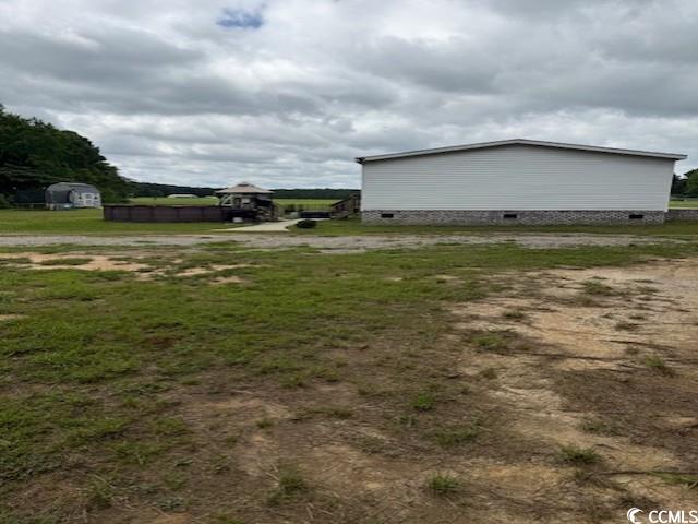 65 Clemmons Drive Tabor City, NC 28463 - Photo 3 of 29 View of yard