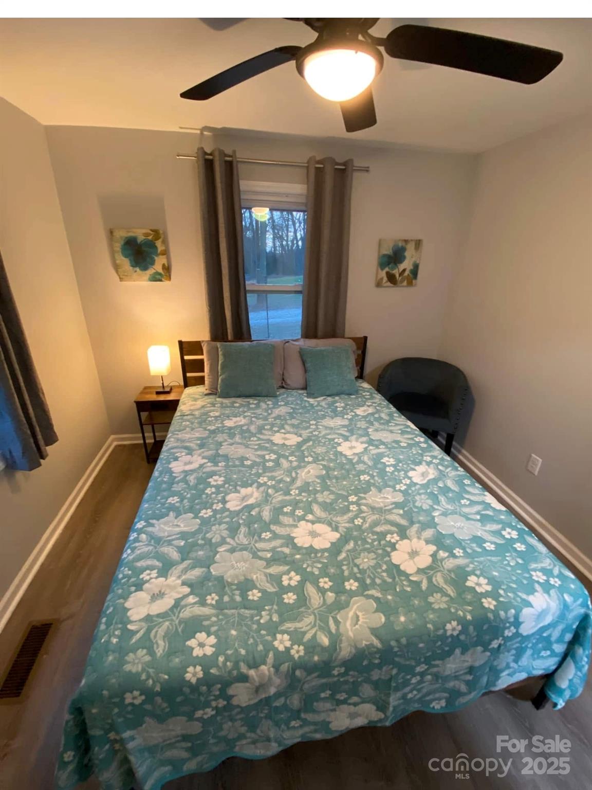 334 Mills Gap Road Asheville, NC 28803 - Photo 15 of 18 a bedroom with a bed and window