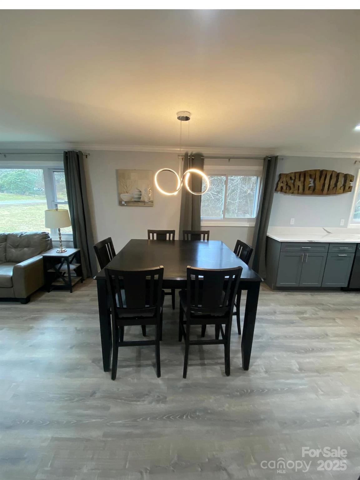 334 Mills Gap Road Asheville, NC 28803 - Photo 10 of 18 a view of a dining room with furniture