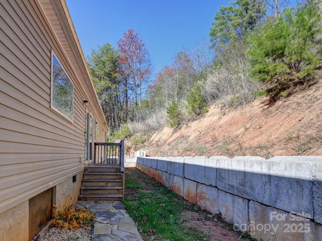 a view of a pathway with a backyard
