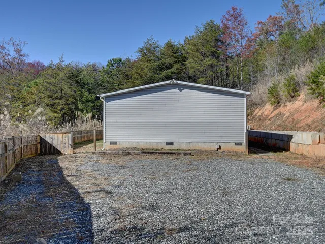 a house with trees in the background