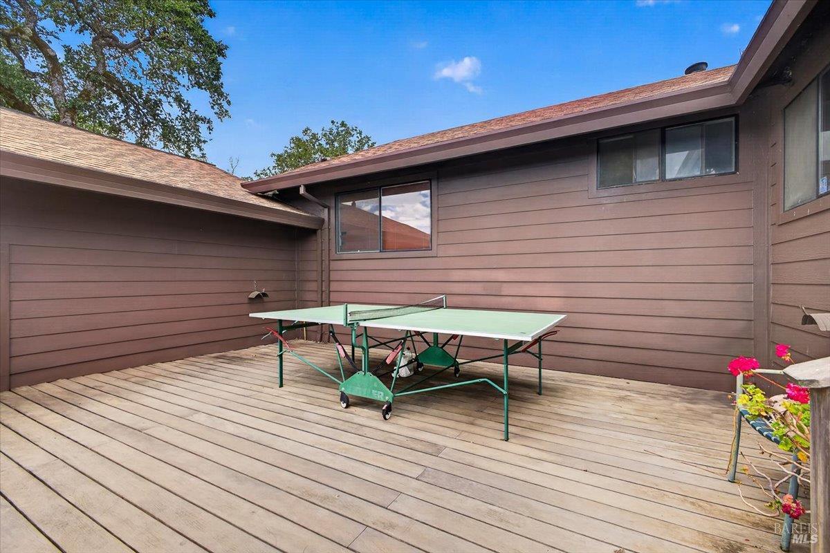 23881 Walling Road Geyserville, CA 95441 - Photo 26 of 40 a roof deck with a table and chairs
