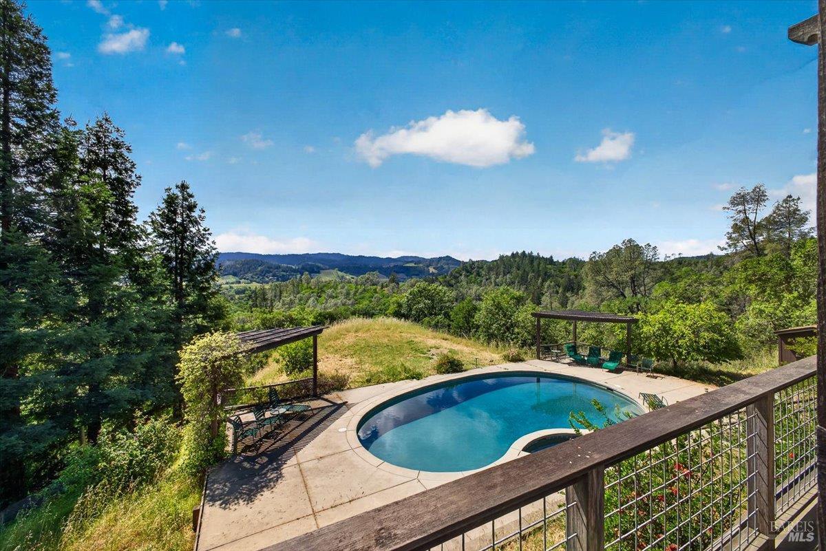 23881 Walling Road Geyserville, CA 95441 - Photo 27 of 40 a view of a balcony with mountain view