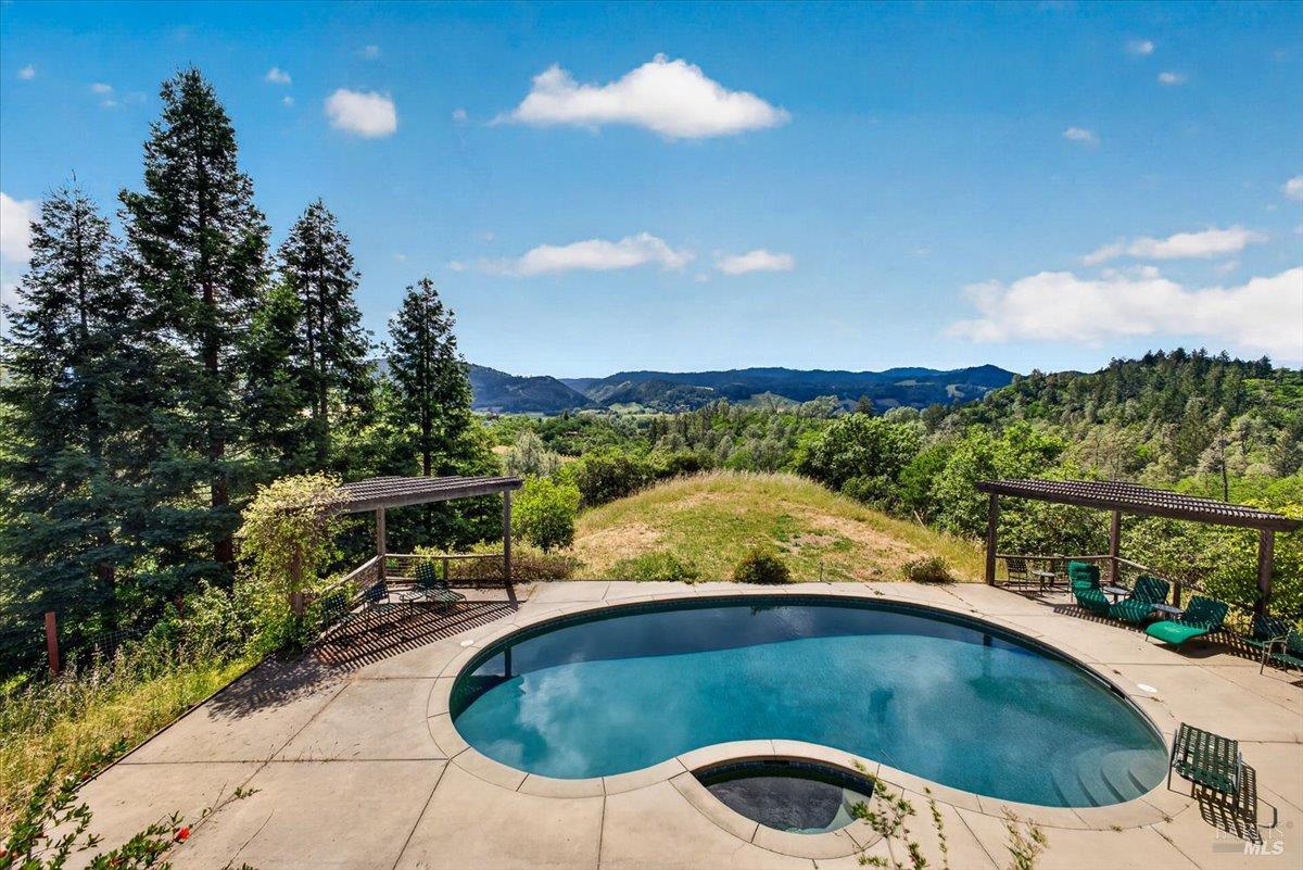 23881 Walling Road Geyserville, CA 95441 - Photo 28 of 40 a view of a swimming pool with a yard