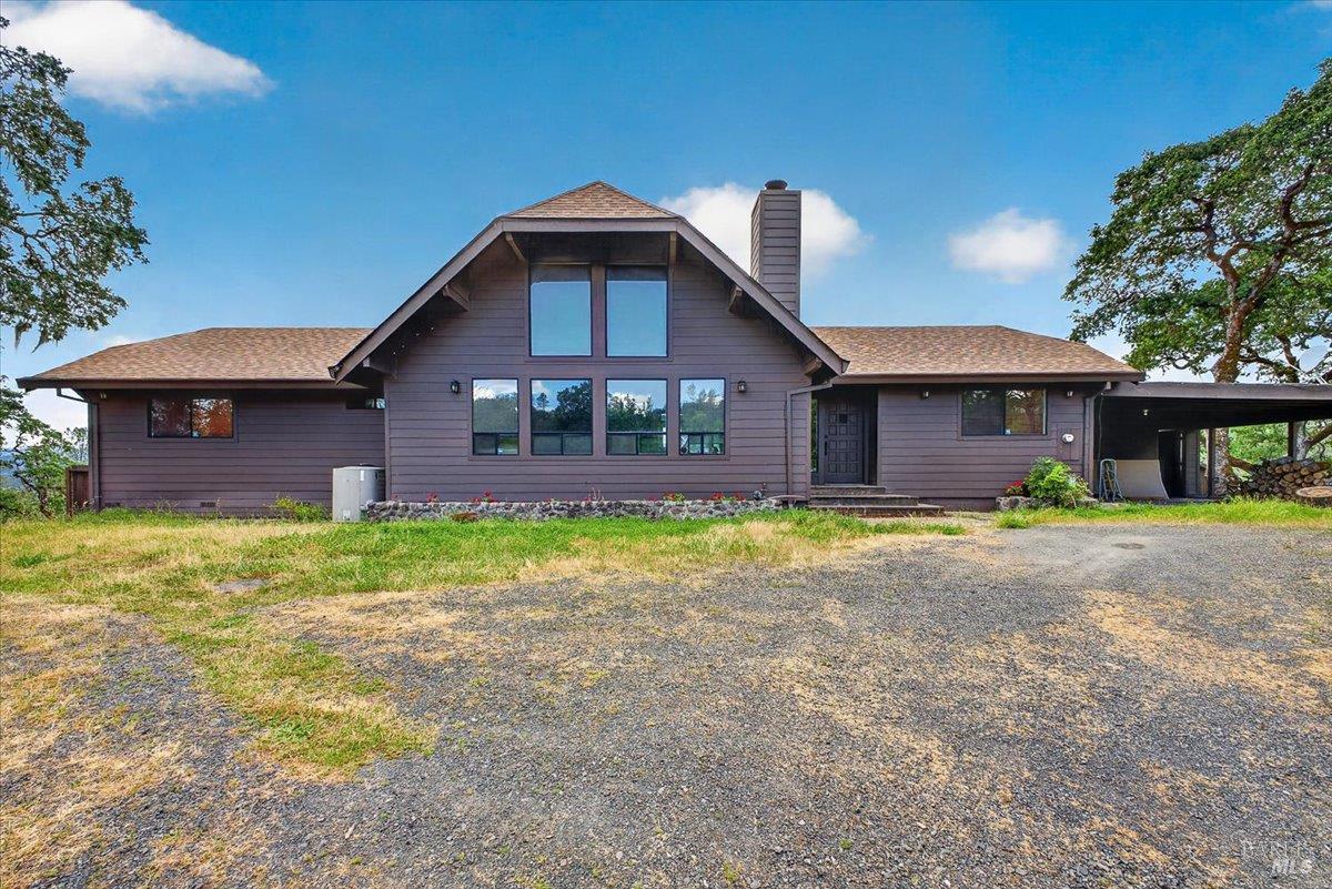 23881 Walling Road Geyserville, CA 95441 - Photo 3 of 40 a front view of a house with a yard