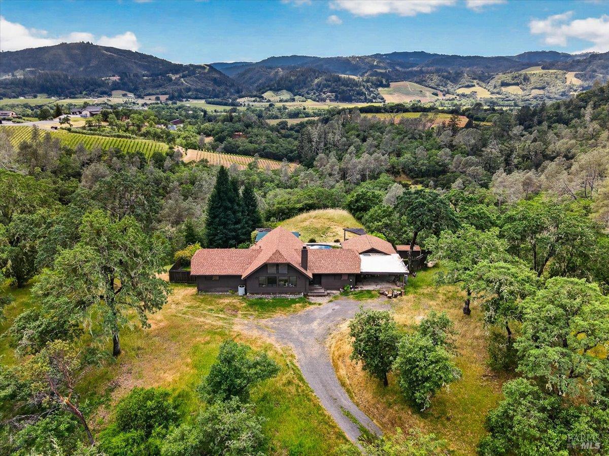 23881 Walling Road Geyserville, CA 95441 - Photo 34 of 40 a view of a house with a mountain