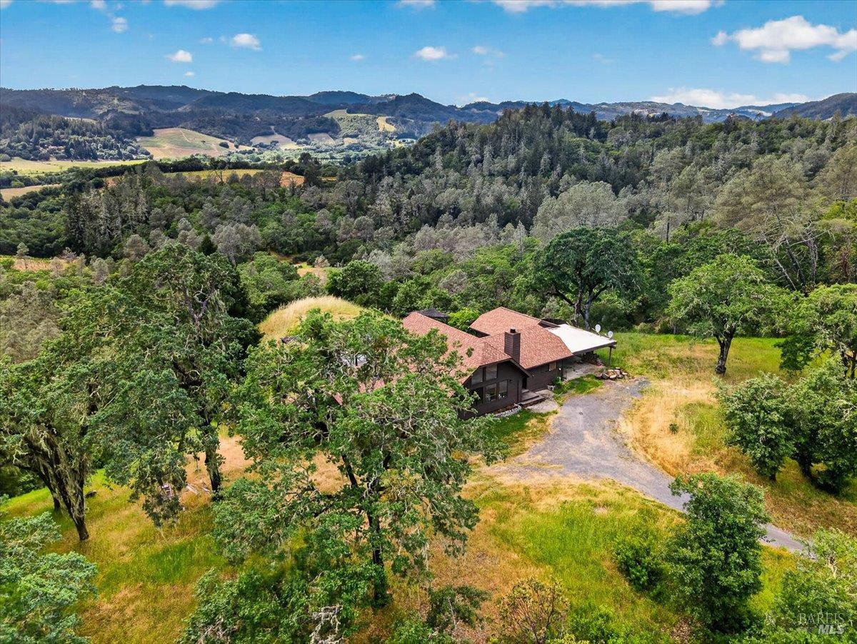 23881 Walling Road Geyserville, CA 95441 - Photo 35 of 40 an aerial view of a house with a yard basket ball court and outdoor seating