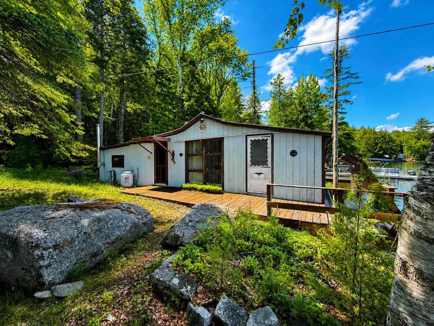 799 Upper Dobsis Road Lakeville, ME 04487 - Photo 4 of 16 Side view of Camp