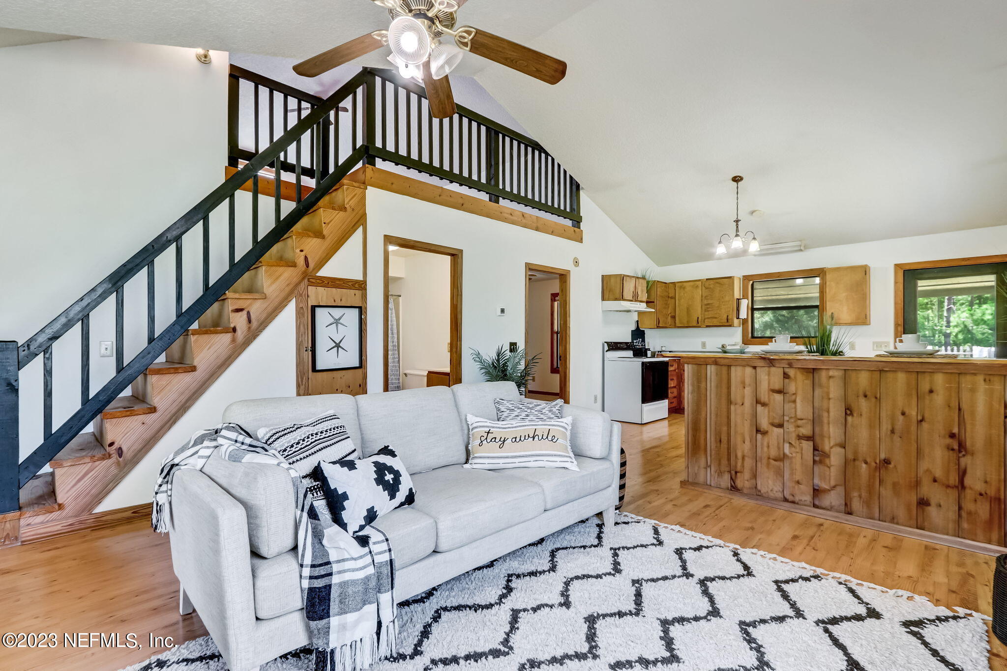 86105 Pages Dairy Road Yulee, FL 32097 - Photo 12 of 39 a view of entryway and hall with wooden floor