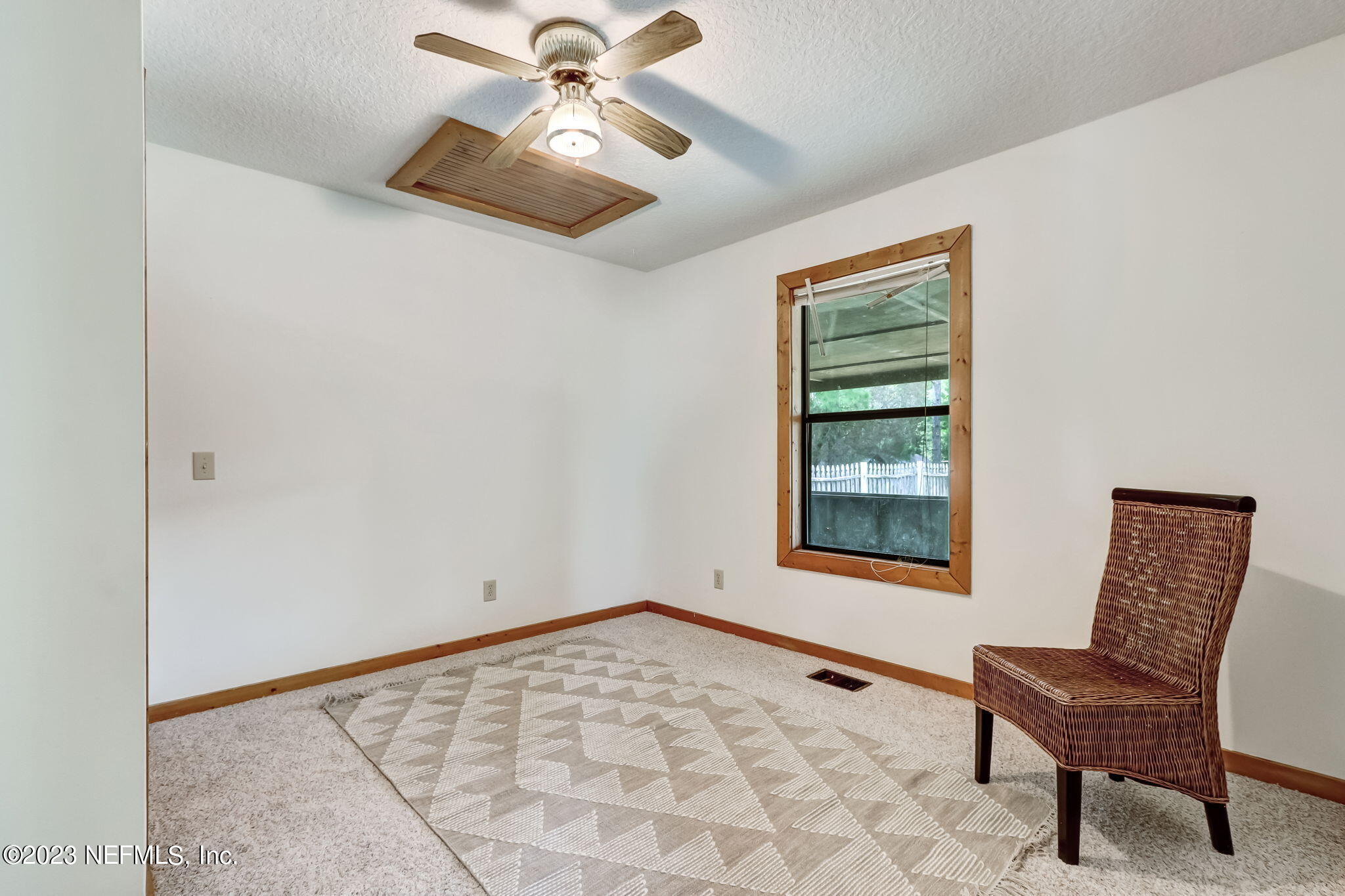 86105 Pages Dairy Road Yulee, FL 32097 - Photo 22 of 39 a view of an empty room with a window