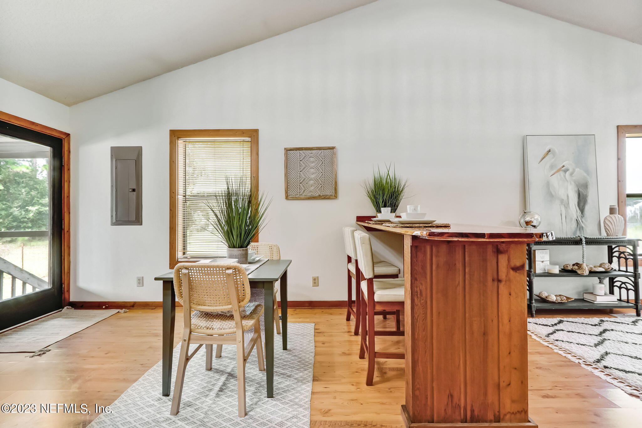 86105 Pages Dairy Road Yulee, FL 32097 - Photo 10 of 39 a view of a dining room with furniture and window