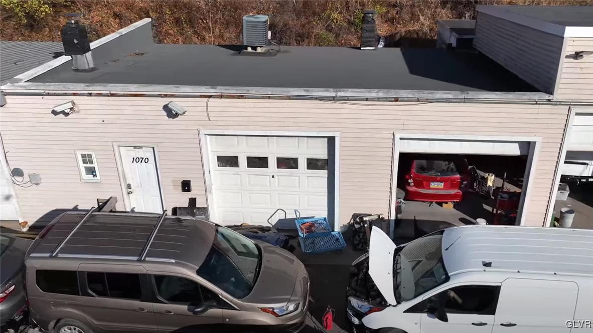 1070 Applebutter Road Bethlehem, PA 18015 - Photo 3 of 5 a view of a patio with table and chairs with an umbrella