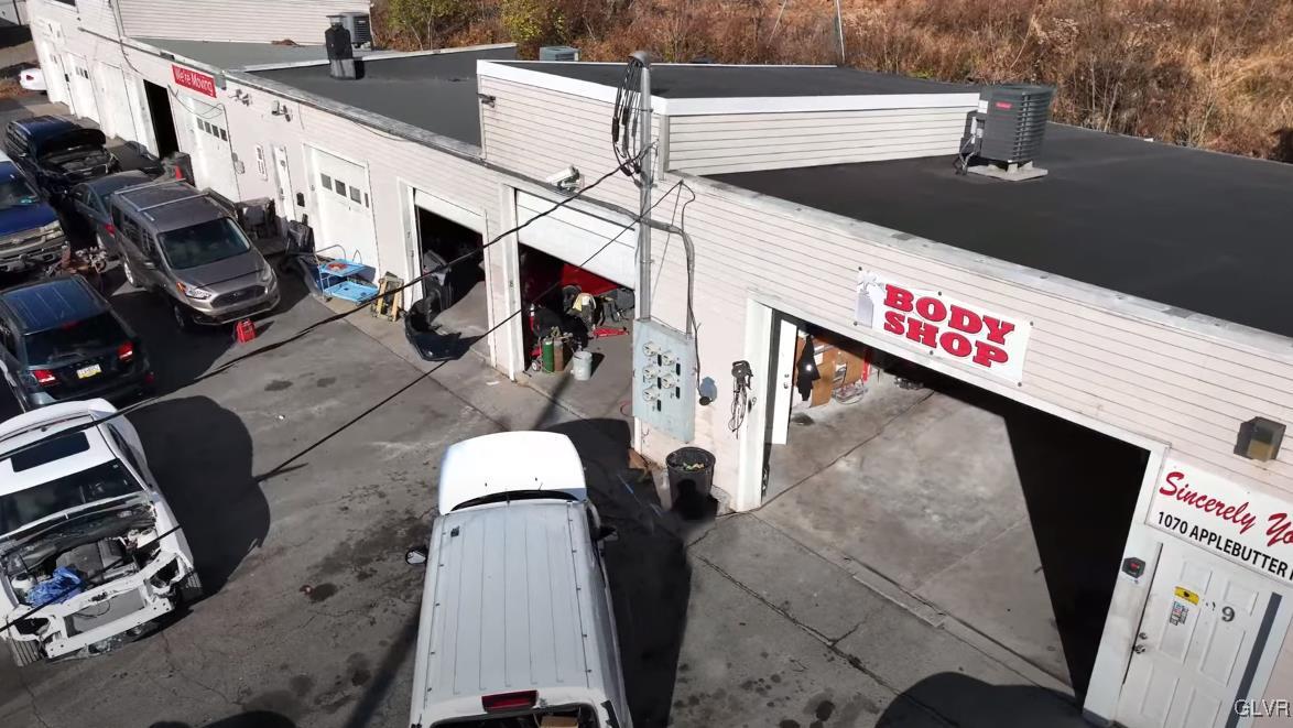 1070 Applebutter Road Bethlehem, PA 18015 - Photo 4 of 5 a view of a patio with table and chairs with wooden floor