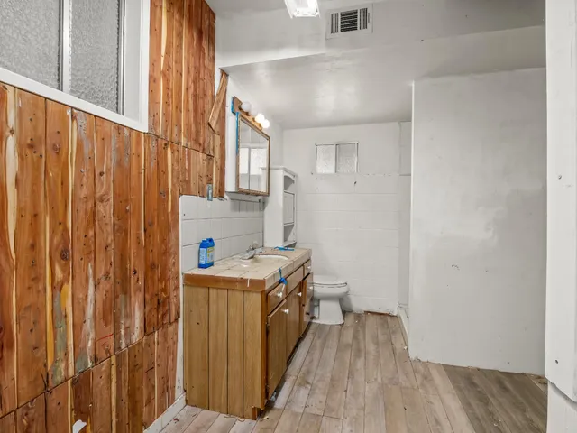 a view of a storage and utility room with a window