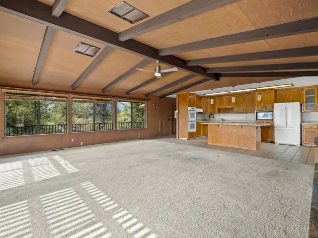 a view of a room with an empty space