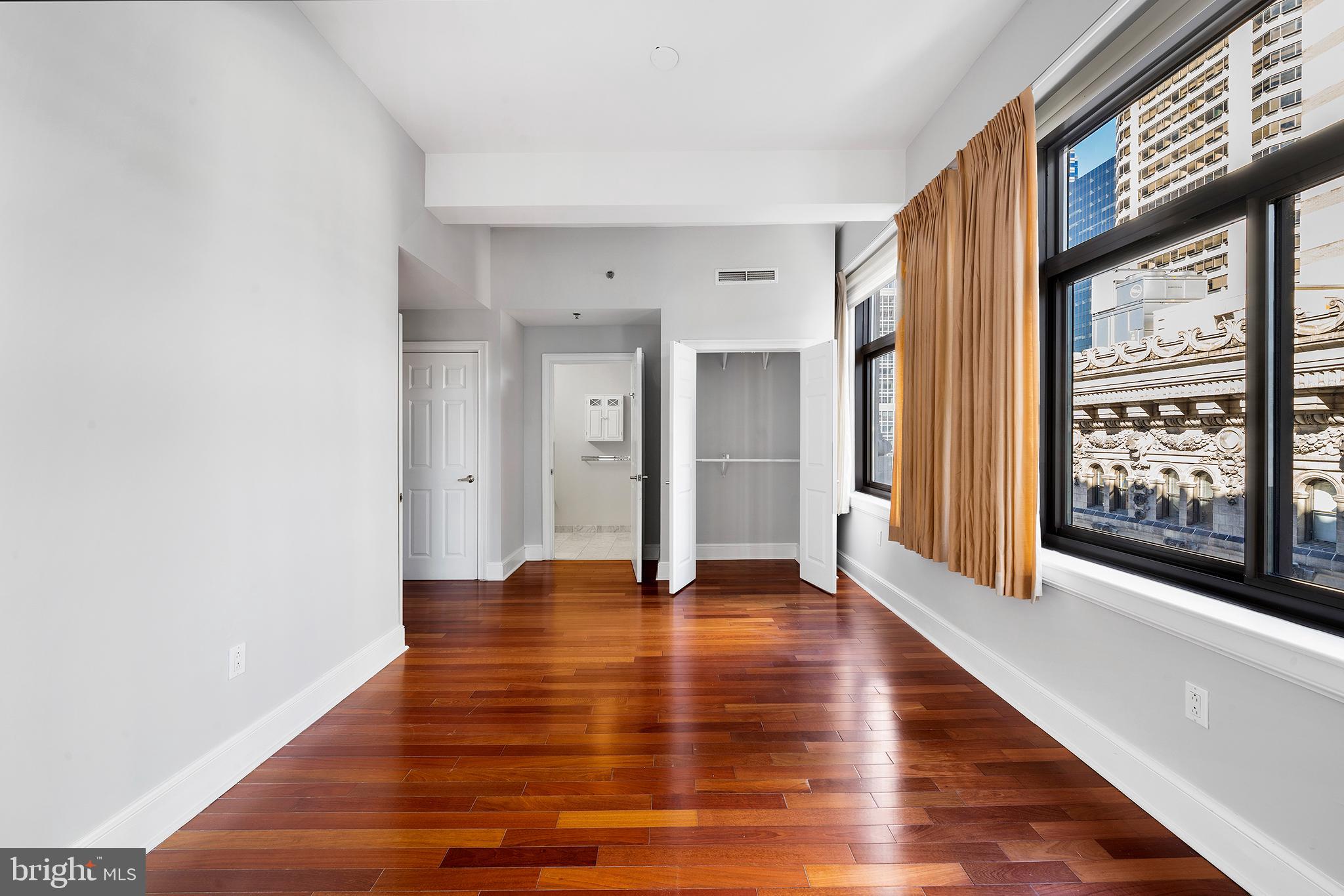 1500 Chestnut Street, Unit 18F Philadelphia, PA 19102 - Photo 11 of 26 Main bedroom showing entry to en suite bathroom