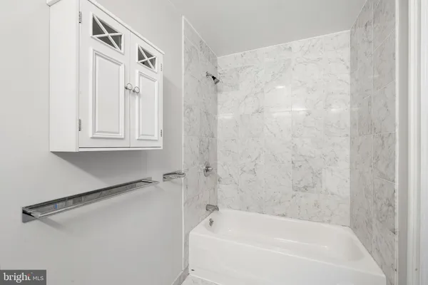a bathroom with a bathtub