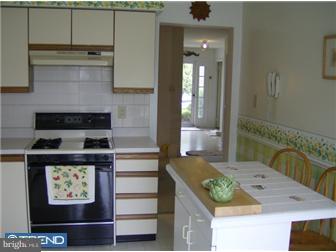 78 Biddle Way Mount Laurel, NJ 08054 - Photo 5 of 8 a kitchen with a stove and a cabinets