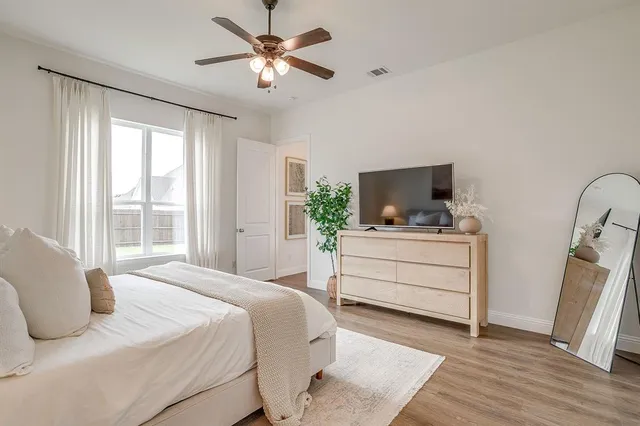 a living room with furniture kitchen view and fireplace