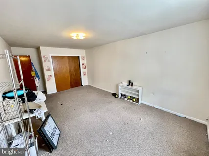 a living room with furniture and furniture