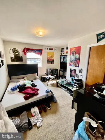 a view of storage and utility room with empty racks