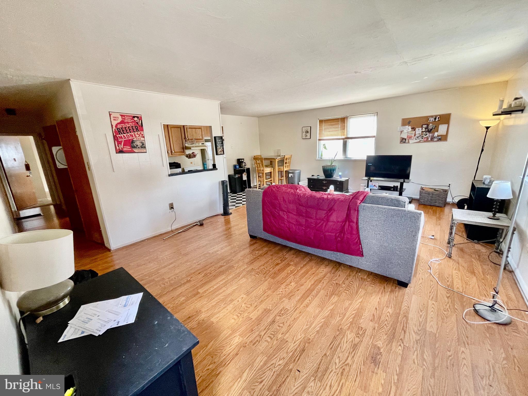 4167 Terrace Street, Unit A Philadelphia, PA 19128 - Photo 3 of 15 a living room with furniture and a wooden floor