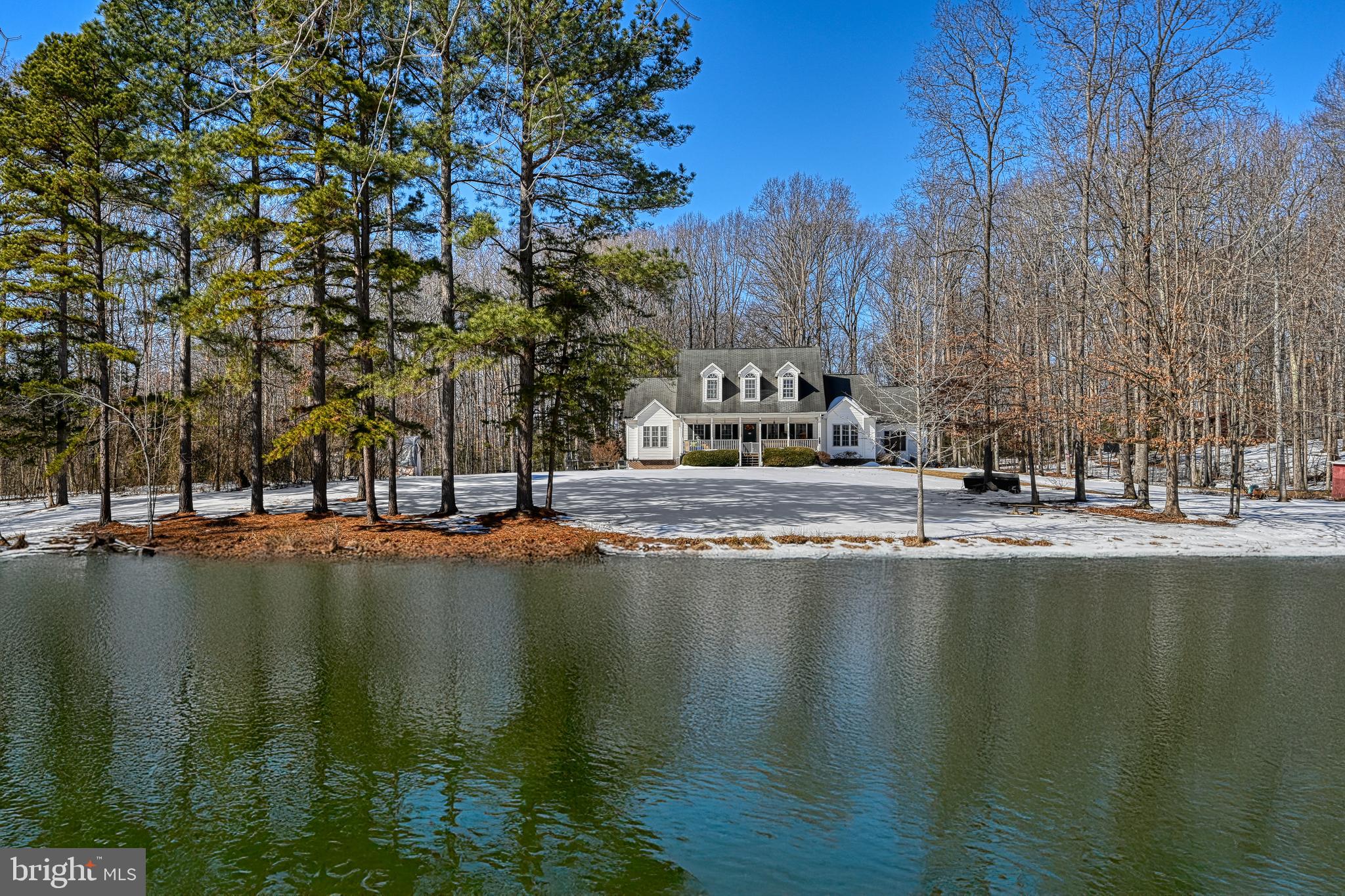 441 Hartwood Road Fredericksburg, VA 22406 - Photo 2 of 58 a view of swimming pool with outdoor seating and lake view