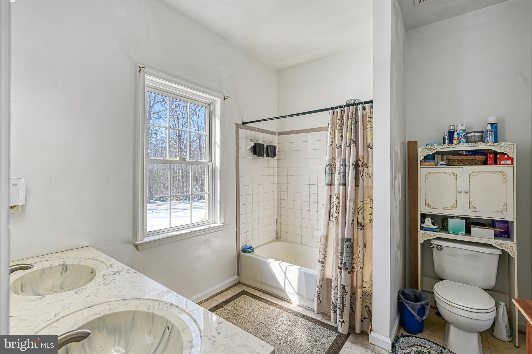 441 Hartwood Road Fredericksburg, VA 22406 - Photo 25 of 58 a bathroom with a granite countertop sink toilet and shower